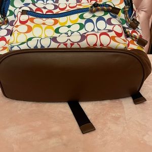 Multi colored coach, backpack, new without tags